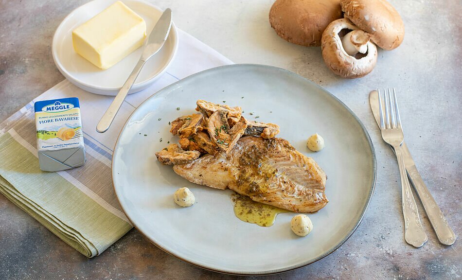 Filetto di pesce con burro salato e funghi