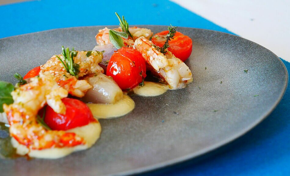 Gamberoni al burro con Crema di melanzane